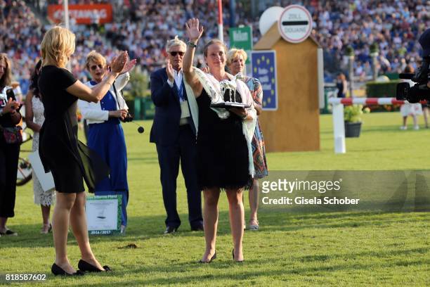 Veronica Ferres gives the award "silver horse" to Isabell Werth during the media night of the CHIO 2017 on July 18, 2017 in Aachen, Germany.