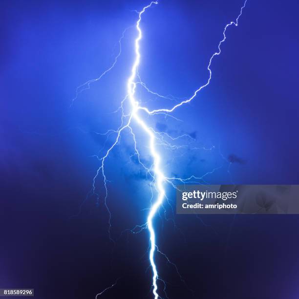 cloud typologies, lightning on blue sky - relâmpago imagens e fotografias de stock