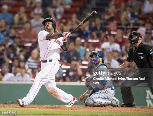 Hanley Ramirez of the Boston Red Sox hits a walk-off home run against the Toronto Blue Jays in the fifteenth inning at Fenway Park on July 18, 2017...