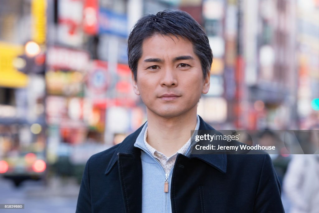 Asian man in urban scene