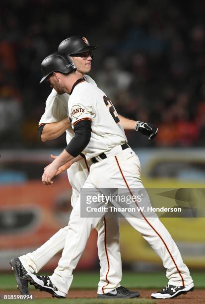 Kelby Tomlinson of the San Francisco Giants comes into the game to pinch run at second base for Conor Gillaspie against the Cleveland Indians in the...