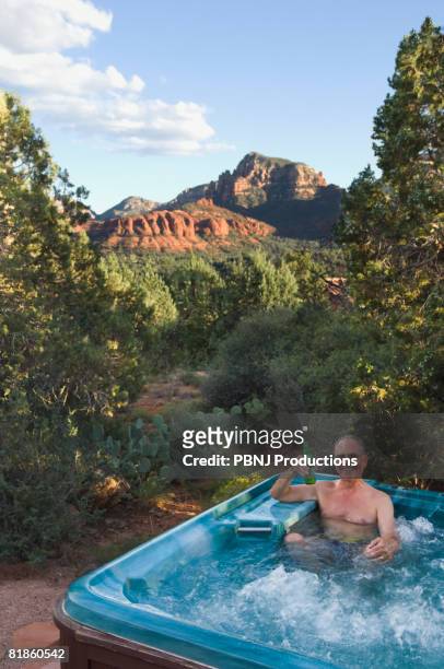 senior man in hot tub - beer luxury stock pictures, royalty-free photos & images