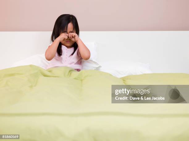 eurasian girl rubbing eyes - kid rubbing eyes stock pictures, royalty-free photos & images