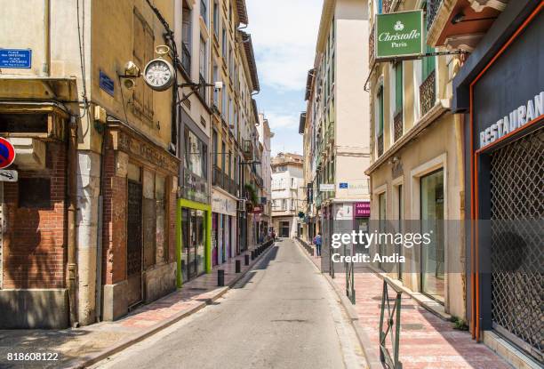 Perpignan : building facades in the street 'rue de l'Argenterie' in the town centre.