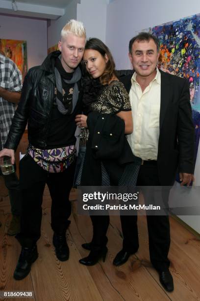 Cody Ross, ? and Novriel Roubini attend Opening Reception of CLOWNS, CHAOS, AND ORDER by Marianne Aulie & Cody Ross at Gallery Sand on September 14,...