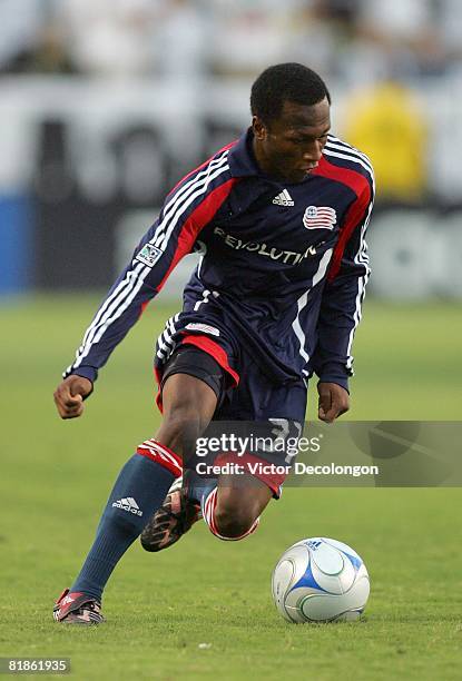 Sainey Nyassi of the New England Revolution plays the ball on the attack against the Los Angeles Galaxy in the first half of their MLS match at the...