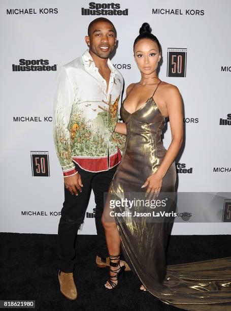 Player Orlando Scandrick and Draya Michele attend the Sports Illustrated Fashionable 50 event at Avenue on July 18, 2017 in Los Angeles, California.