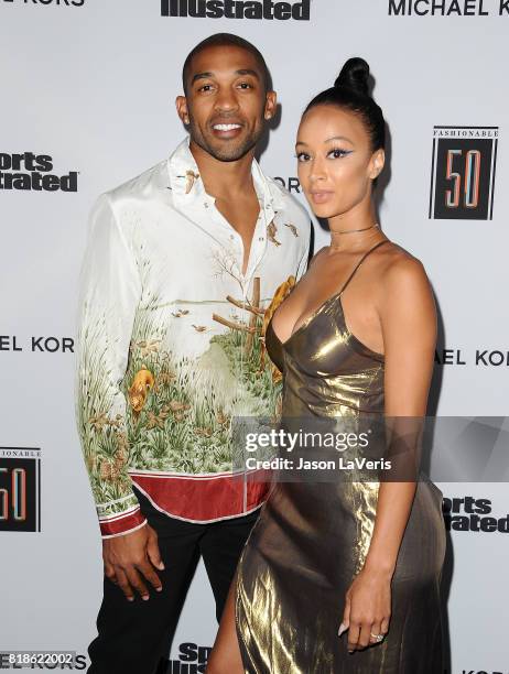 Player Orlando Scandrick and Draya Michele attend the Sports Illustrated Fashionable 50 event at Avenue on July 18, 2017 in Los Angeles, California.