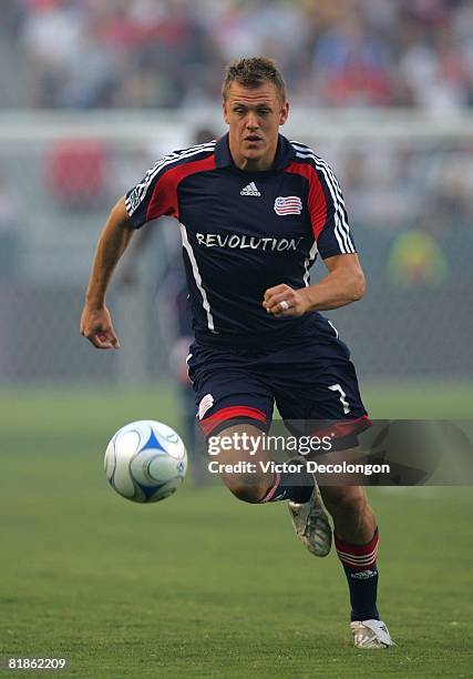 Adam Cristman of the New England Revolution runs after the ball on the attack in the first half of their MLS match against the Los Angeles Galaxy at...