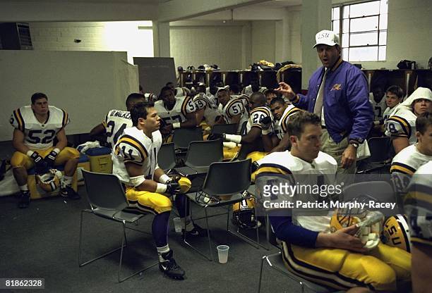 College Football: Louisiana State coach Curley Hallman in locker room with team during halftime of game vs Arkansas, Little Rock, AR