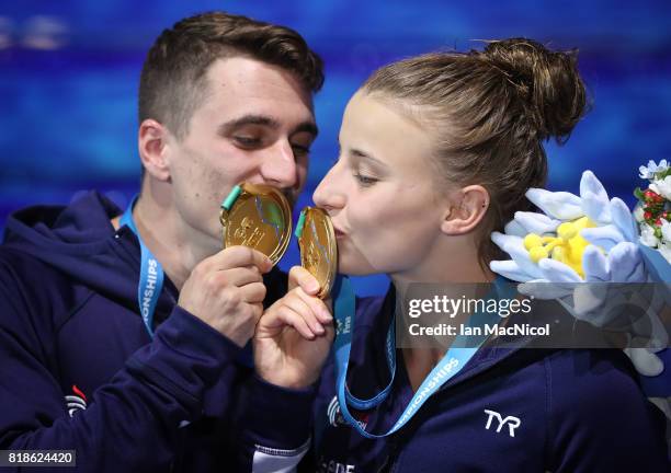 Gold medalists Laura Marino and Mattieu Rosset of France pose with the medals won during the Mixed Diving Team final on day five of the Budapest 2017...