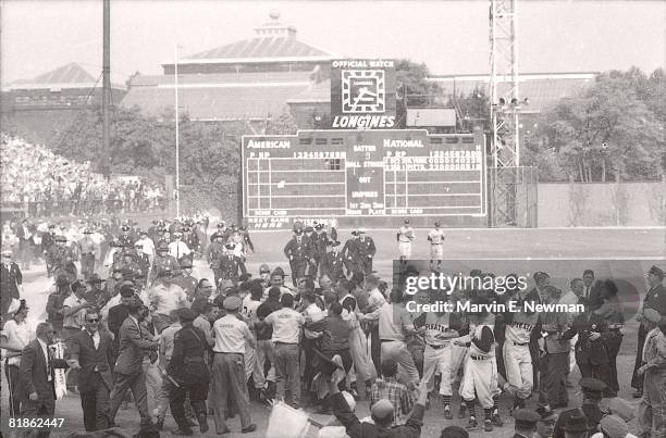 Baseball: World Series, Pittsburgh Pirates Bill Mazeroski victorious with team and fans after 9th inning game winning HR vs New York Yankees, View of...