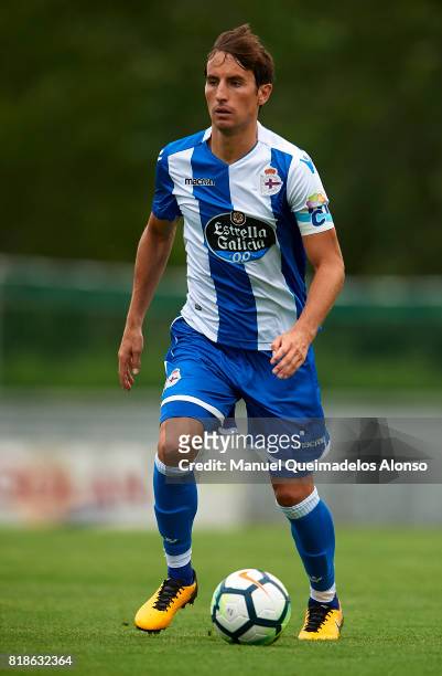 Pedro Mosquera of Deportivo de La Coruna runs with the ball during the pre-season friendly match between Cerceda and Deportivo de La Coruna at O Roxo...