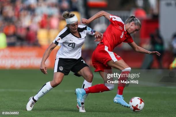 Lisa Makas of Austria and Ana-Maria Crnogorcevic of Switzerland battle for the ball during the Group C match between Austria and Switzerland during...