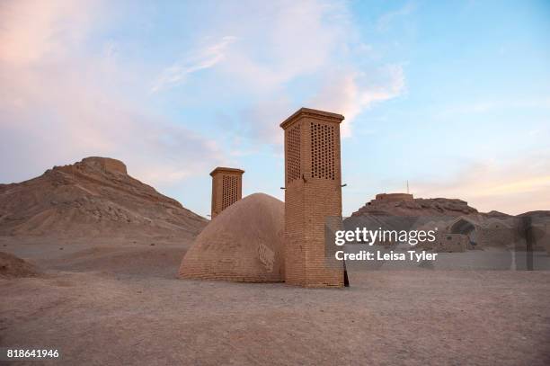 At the Towers of Silence, traditional Zoroastrian burial circles where bodies were left to be eaten by scavenger birds, outside of Yazd, Iran. Yazd...