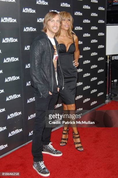 David Guetta and Cathy Guetta attend ACTIVISION E3 2010 PREVIEW EVENT AT STAPLES CENTER at Staples Center on June 14, 2010 in Los Angeles, California.