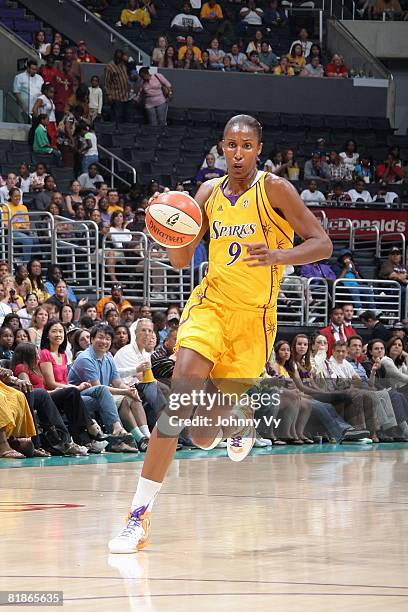 Lisa Leslie of the Los Angeles Sparks moves the ball against the Minnesota Lynx during the game on July 3, 2008 at Staples Center in Los Angeles,...