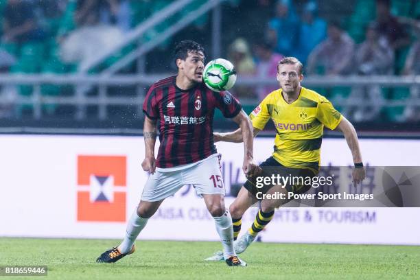 Milan Defender Gustavo Gomez plays against Borussia Dortmund Midfielder Andre Schurrle in action during the International Champions Cup 2017 match...