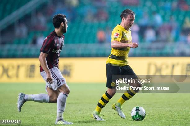 Borussia Dortmund Midfielder Felix Passlack fights for the ball with AC Milan Midfielder Jose Sosa during the International Champions Cup 2017 match...