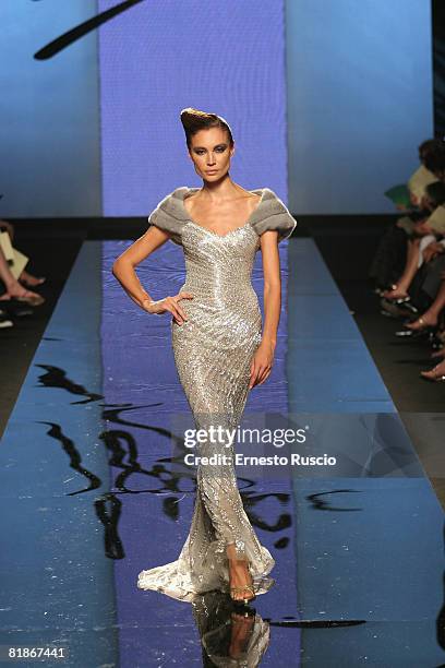 Model walks the runway during Fausto Sarli fashion show as part of Rome fashion week in Santo Spirito in Sassia on 6 July, 2008 in Rome, Italy.