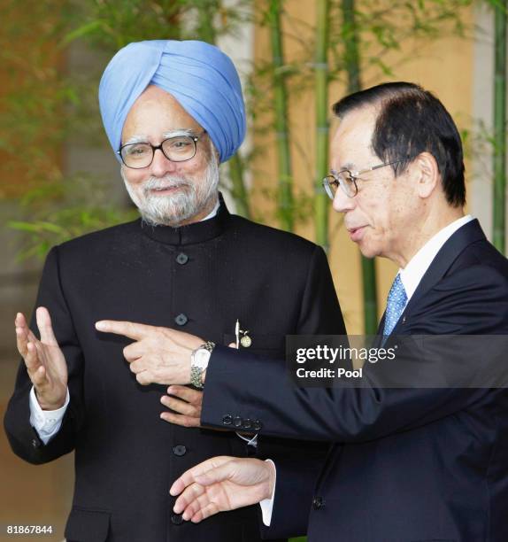 Indian Prime Minister Manmohan Singh is greeted by Japanese Prime Minister Yasuo Fukuda upon arrival during the G8 Toyako Summit at the Windsor Hotel...