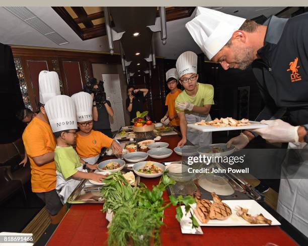 Jurgen Klopp manager of Liverpool takes part in a cookery lesson on July 19, 2017 in Hong Kong, Hong Kong.