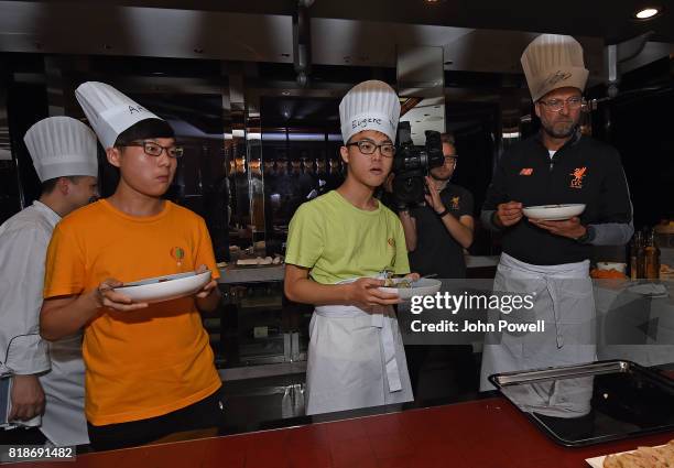 Jurgen Klopp manager of Liverpool takes part in a cookery lesson on July 19, 2017 in Hong Kong, Hong Kong.