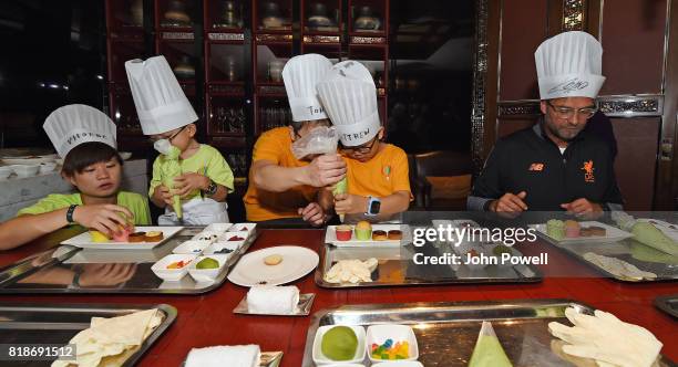 Jurgen Klopp manager of Liverpool takes part in a cookery lesson on July 19, 2017 in Hong Kong, Hong Kong.