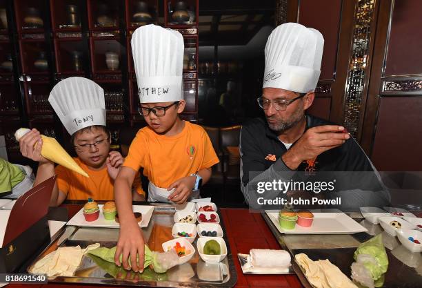 Jurgen Klopp manager of Liverpool takes part in a cookery lesson on July 19, 2017 in Hong Kong, Hong Kong.