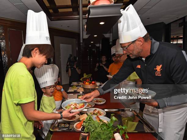 Jurgen Klopp manager of Liverpool takes part in a cookery lesson on July 19, 2017 in Hong Kong, Hong Kong.