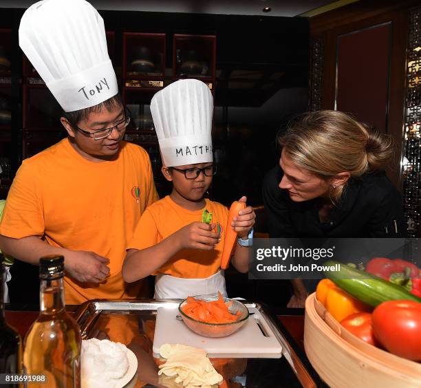 Jurgen Klopp manager of Liverpool takes part in a cookery lesson on July 19, 2017 in Hong Kong, Hong Kong.