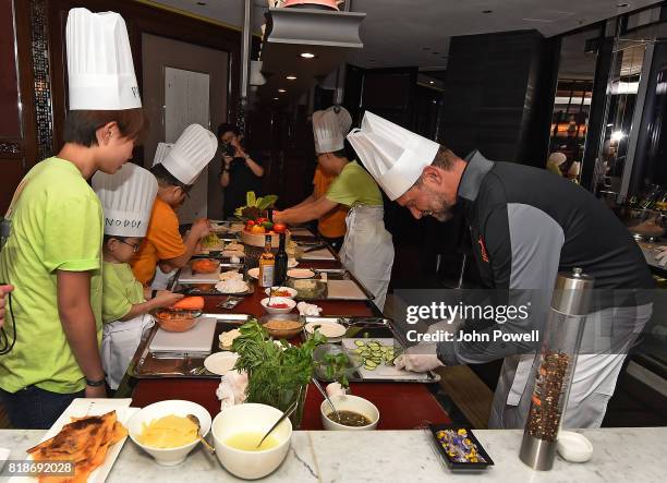 Jurgen Klopp manager of Liverpool takes part in a cookery lesson on July 19, 2017 in Hong Kong, Hong Kong.