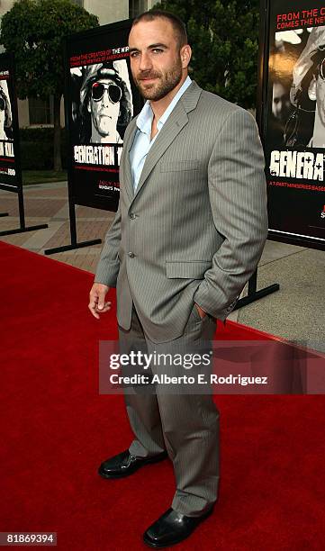 Former U.S. Marine Eric Kocher arrives at the HBO Films' premiere of the miniseries "Generation Kill" held at Paramount Theater inside Paramount...