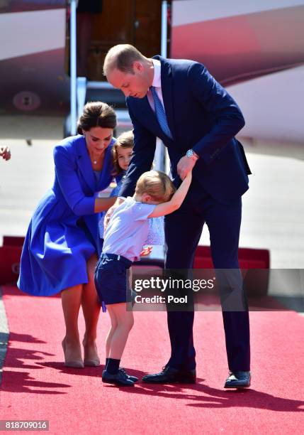 Prince William, Duke of Cambridge, Catherine, Duchess of Cambridge with Prince George of Cambridge and Princess Charlotte of Cambridge as they arrive...