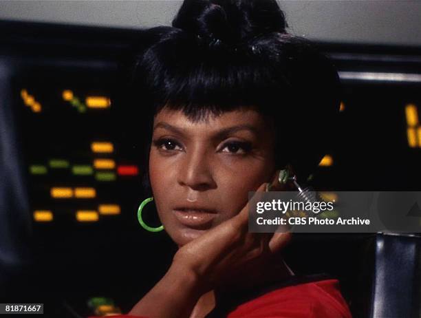 American actress Nichelle Nichols appears as Uhura in a scene from 'The Man Trap,' the premiere episode of 'Star Trek,' which aired on September 8,...