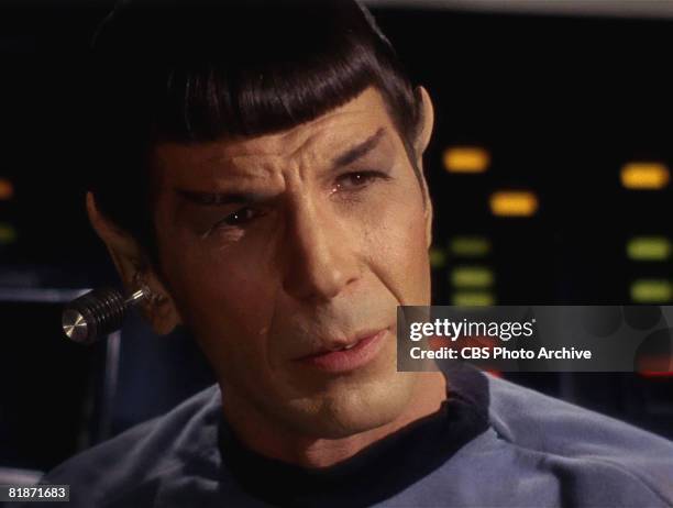 American actor Leonard Nimoy appears as Mr. Spock in a scene from 'The Man Trap,' the premiere episode of 'Star Trek,' which aired on September 8,...