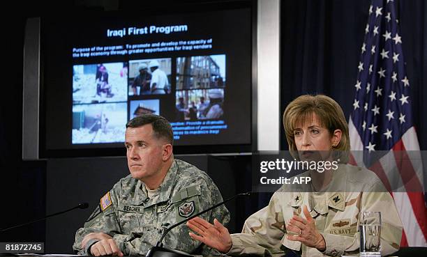 Major General Kevin J. Bergner, spokesman for Multi-National Forces-Iraq, and Rear Admiral Kathleen M. Dussault, commander of the Joint Contracting...