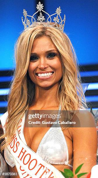 Sara Hoots poses on stage after winning the 12th Annual Hooters International Swimsuit Pageant at the Broward Center for the Performing Arts on July...