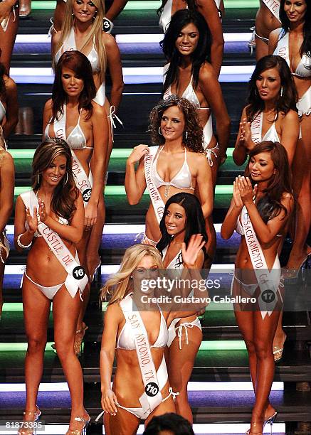Sara Hoots celebrates on stage after winning the 12th Annual Hooters International Swimsuit Pageant at the Broward Center for the Performing Arts on...