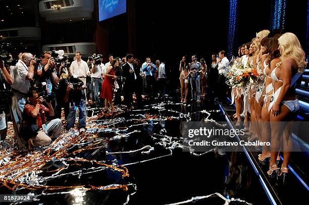 Contestants stand on stage during the 12th Annual Hooters International Swimsuit Pageant at the Broward Center for the Performing Arts on July 8,...