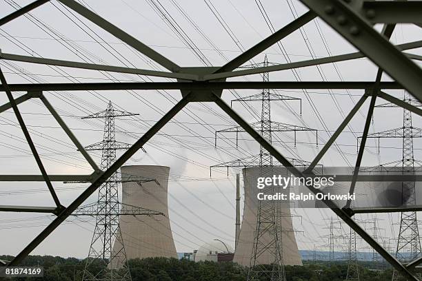 Electricity pylons stand in front of Grafenrheinfeld nuclear power plant on July 9, 2008 in Grafenrheinfeld near Wuerzburg, Germany. Many German...