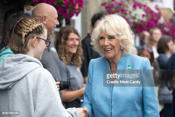 Camilla, Duchess of Cornwall meets members of the public as she visits Porthleven during an annual trip to Devon and Cornwall on July 19, 2017 in...