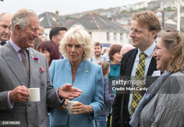 Prince Charles, Prince of Wales and Camilla, Duchess of Cornwall, meet members of the public as they visit Porthleven during an annual trip to Devon...