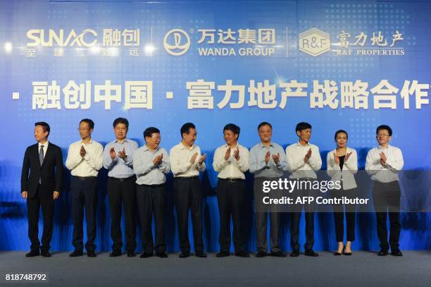 Chairman of China's Wanda Group Wang Jianlin , chairman of Sunac China Holdings Limited Sun Hongbin , and chairman of R&F Properties Li Sze-lim...