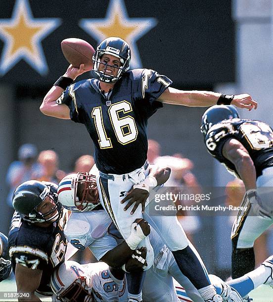 Football: San Diego Chargers QB Ryan Leaf in action, making under pressure pass vs Tennessee Oilers Gary Walker , Nashville, TN 9/13/1998