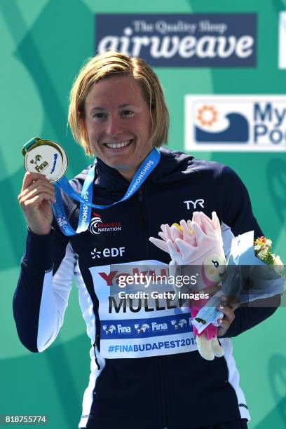 Aurelie Muller of France celebrates finishing in 2nd place following the Womens 5km Open Water Swimming on day five of the Budapest 2017 FINA World...