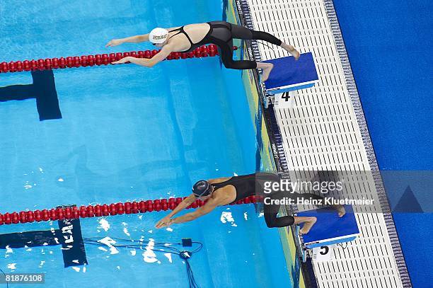 Olympic Trials: Aerial view of Katie Hoff and Dara Torres in action from block during start of 100M Freestyle Preliminary Round at Qwest Center....