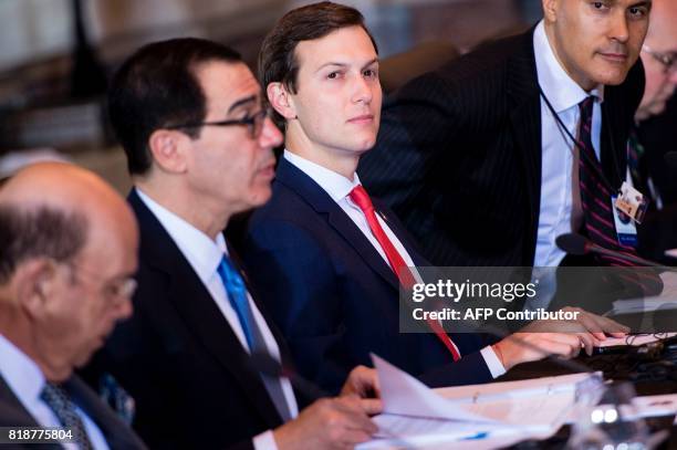 Secretary of Commerce Wilbur Ross , US Secretary of the Treasury Steven Mnuchin , Senior Advisor Jared Kushner and Chris Adams, US Treasury, take...