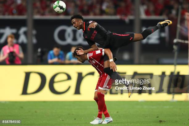 Joe Willock of Arsenal FC of Arsenal FC competes for the ball with Juan Bernat of FC Bayern during the 2017 International Champions Cup football...