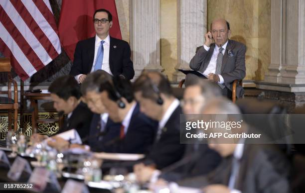 Treasury Secretary Steven Mnuchin and US Commerce Secretary Wilbur Ross attend a US and China comprehensive Economic Dialogue at the US Department of...